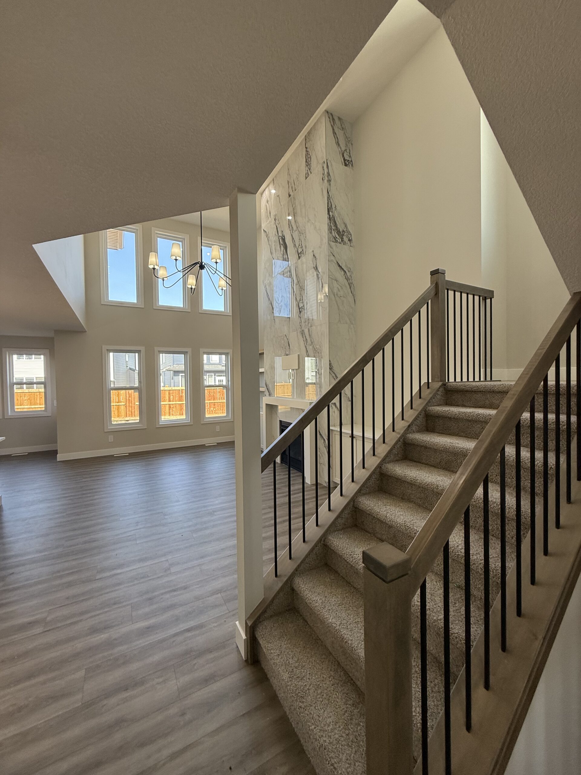 Wooden stairway with natural light | The Paint Masters