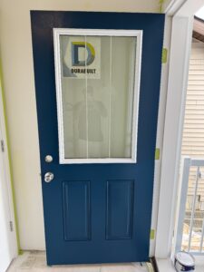 Blue door with "dbl" sign | The Paint Masters