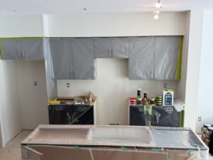 Kitchen cabinets being painted | The Paint Masters (quote)