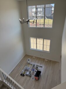 Room with hardwood floors & light | The Paint Masters