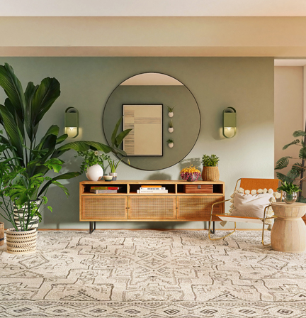 Cozy living room with plants & mirror | The Paint Masters